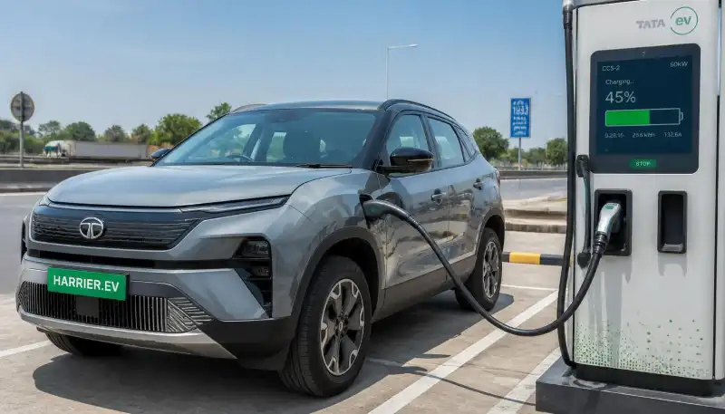 Tata Harrier EV plugged into a DC fast charger at a highway charging station