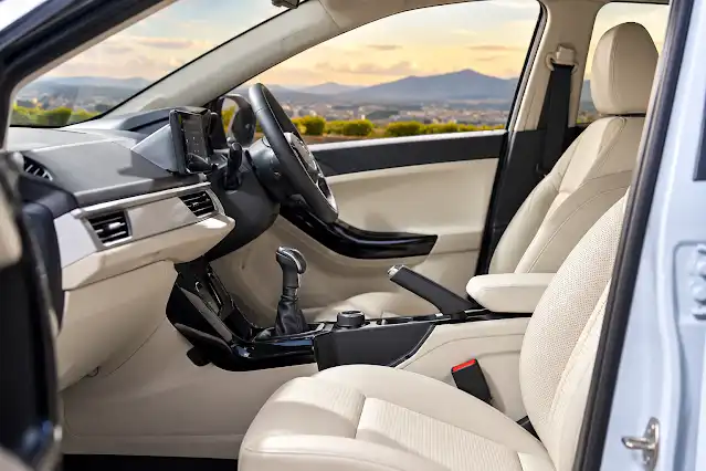 Tata Curvv white cabin interior seating dashboard view